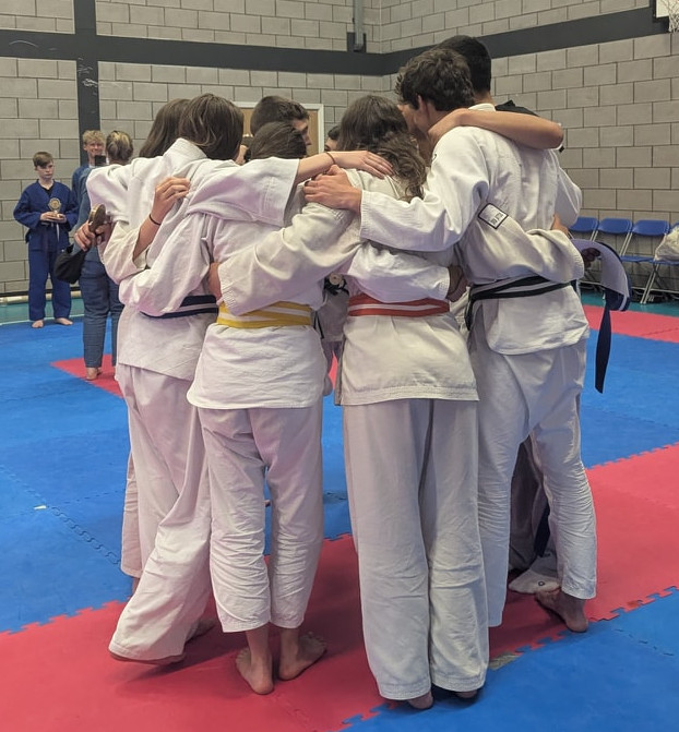 Junior students in a group hug!