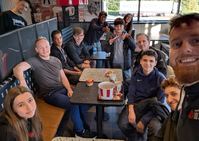 The team celebrates success with a KFC